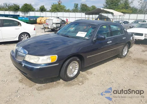 1999 Lincoln Town Car Executive из США, поврежденный, VIN 1LNHM81W6XY716837